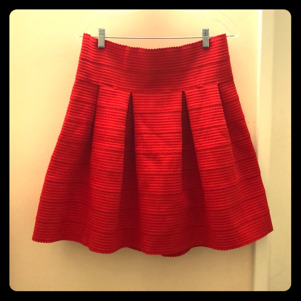 Orange skirt above knee